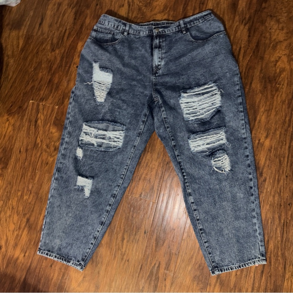 Woman’s distressed jeans